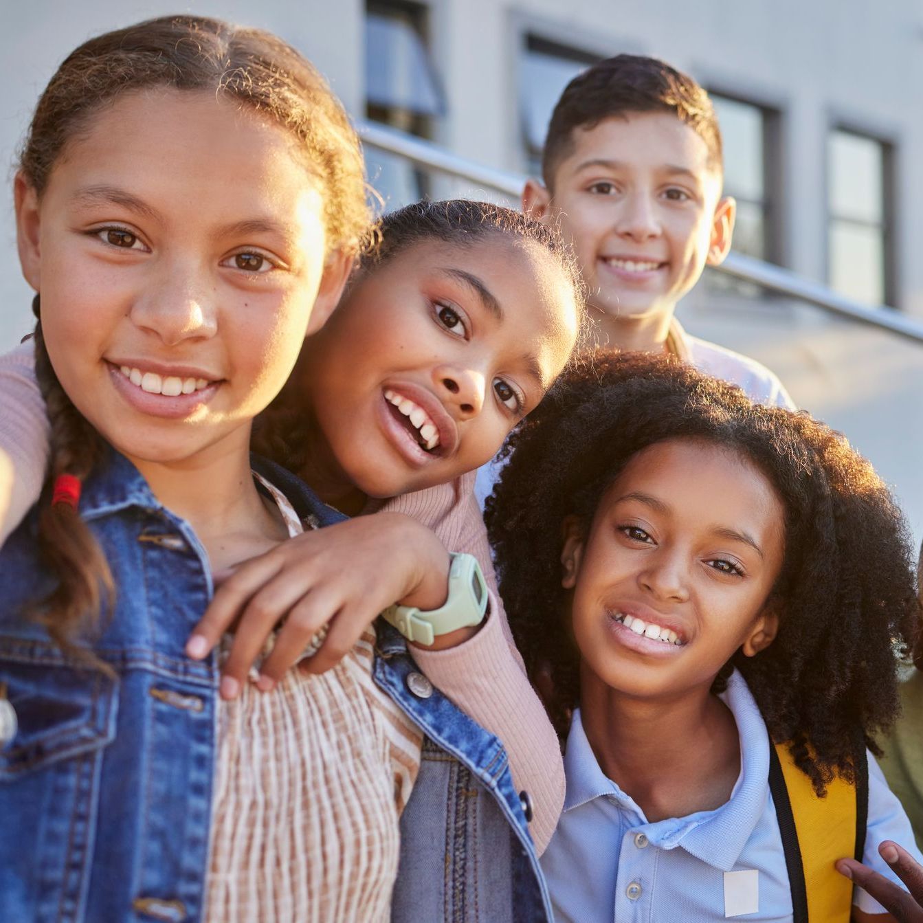 A group of children are posing for a picture together