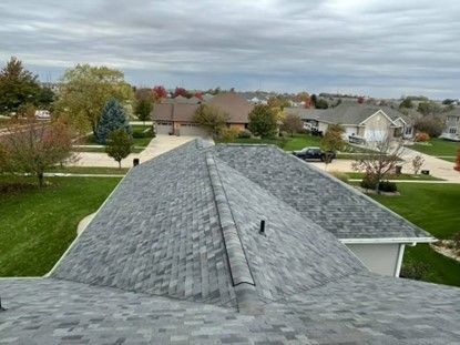 Picture of residential roofing installation. Picture of residential roofing installation.