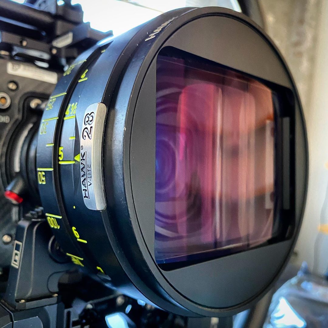 A close up of a camera lens that says hawk on it