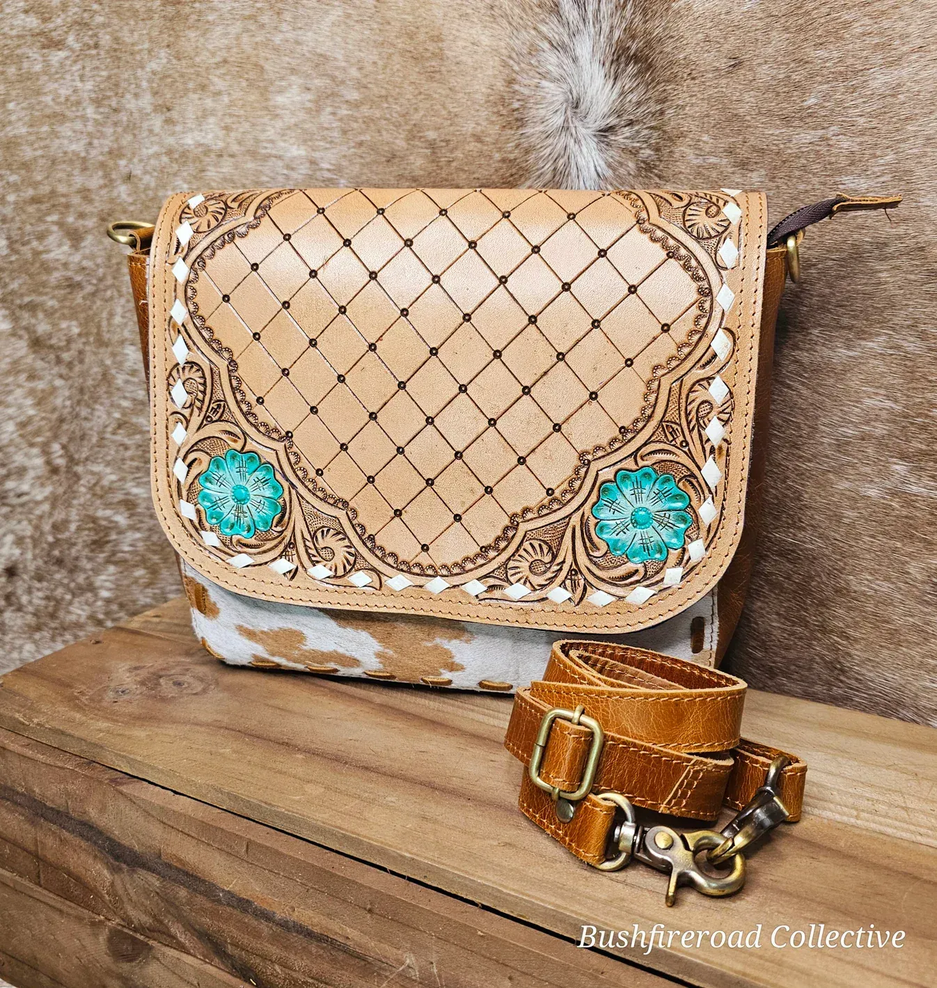 Brown And Gray Duffel Bag With Leather Accents And A Tag, On A Wooden Surface — Bushfire Road Collective in Mareeba ,QLD