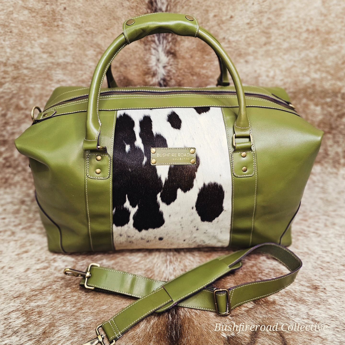 Olive Green Leather And Cowhide Travel Bag With Handles — Bushfire Road Collective in Mareeba ,QLD