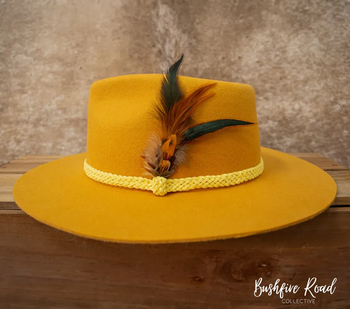 Yellow Felt Fedora With Braided Band and Feather Embellishment — Bushfire Road Collective in Mareeba, QLD