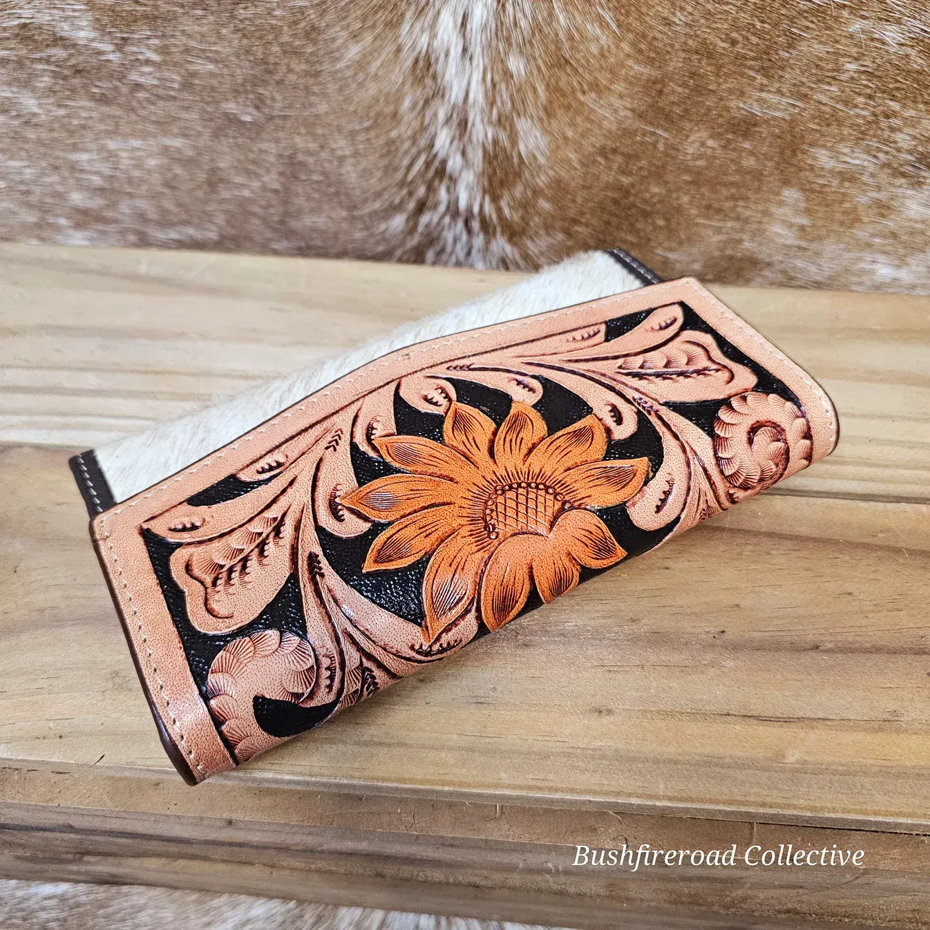 Cowhide Accessories: Earrings And Wallets On A Cowhide Background — Bushfire Road Collective in Mareeba ,QLD