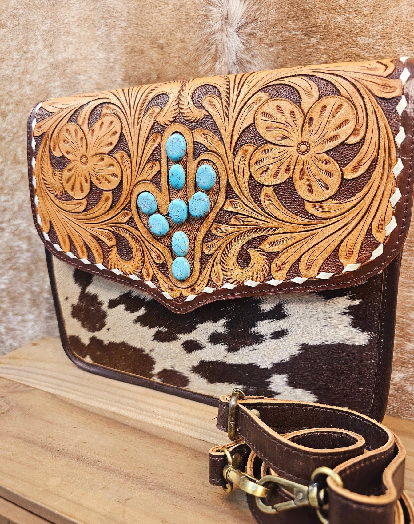 Brown Leather Crossbody Bag With Patterned Straps, On A Cowhide Background — Bushfire Road Collective in Mareeba ,QLD