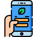 a hand is holding a cell phone with a green leaf on the screen .