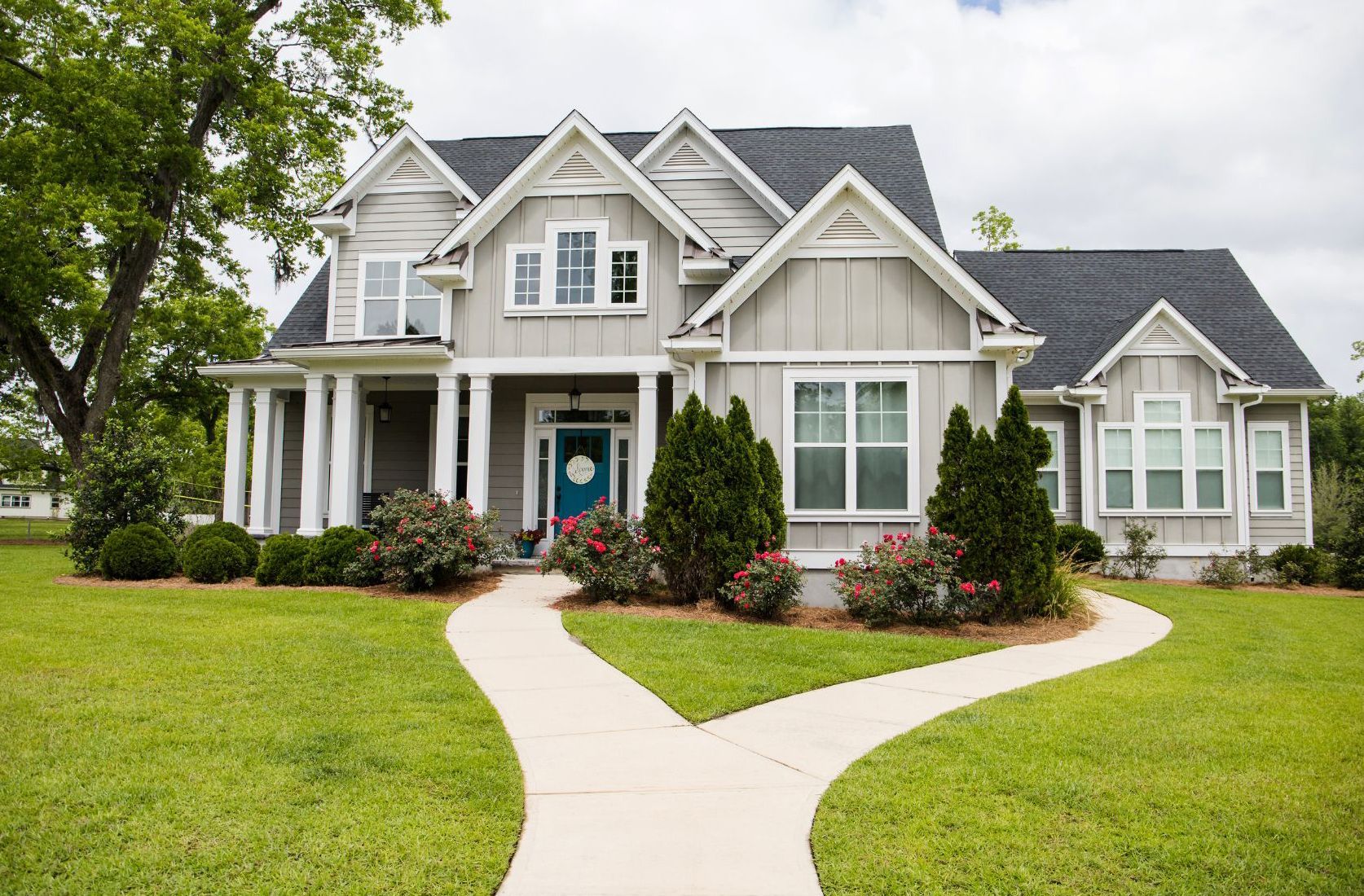luxury modern home with teal door