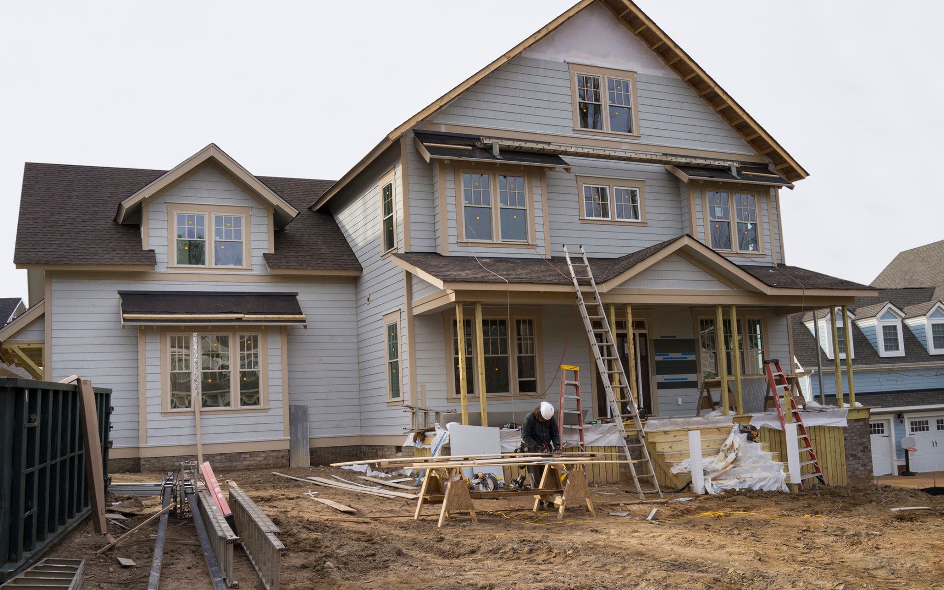 A large house is being built in a residential area