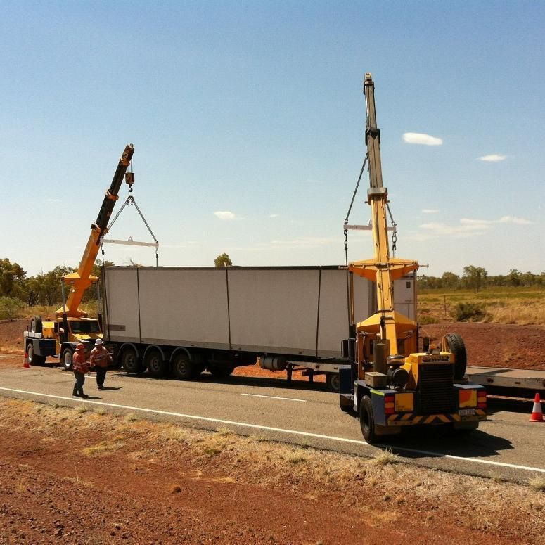 Truck is Being Lifted by a Crane on the Side of the Road — Barkly Hire in Ryan, QLD