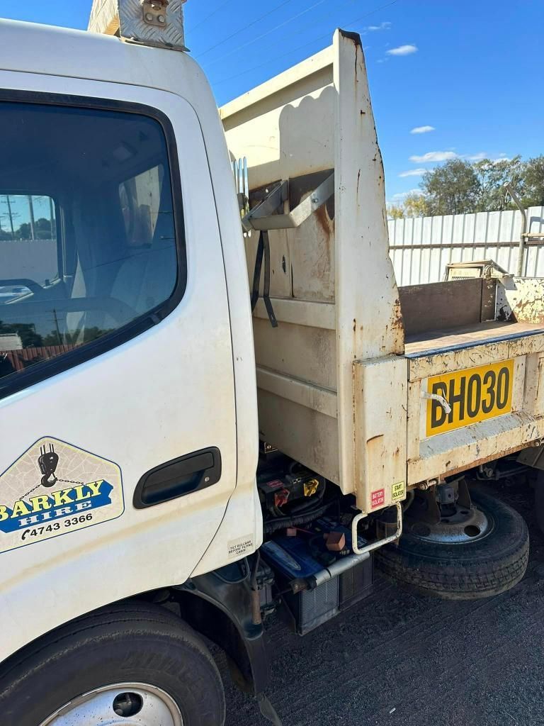 White Dump Truck With a Yellow License Plate That Says Bh030 — Barkly Hire in Ryan, QLD
