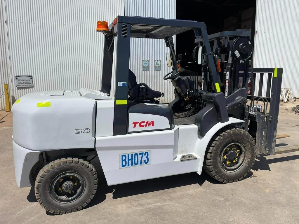 White Forklift is Parked in Front of a Building — Barkly Hire in Ryan, QLD