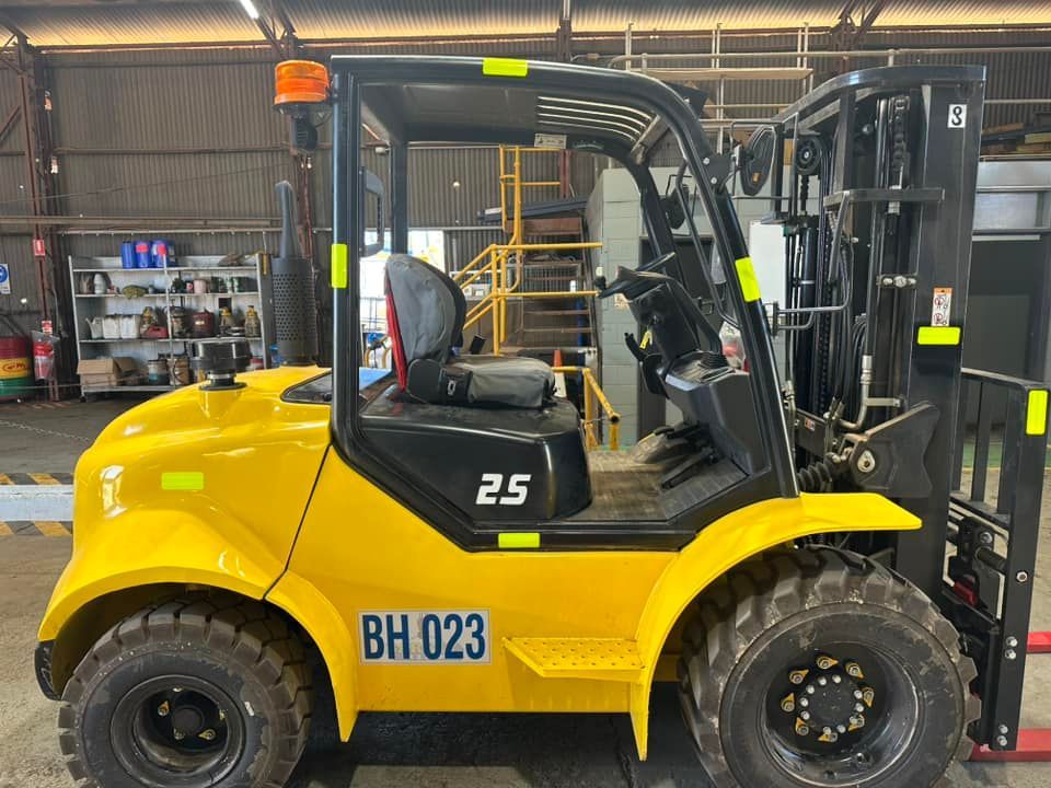 Yellow Forklift is Parked in a Warehouse — Barkly Hire in Ryan, QLD