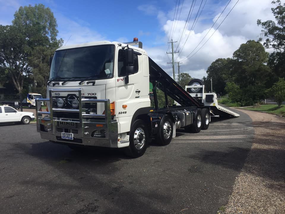 White Tow Truck is Parked on the Side of the Road — Barkly Hire in Ryan, QLD