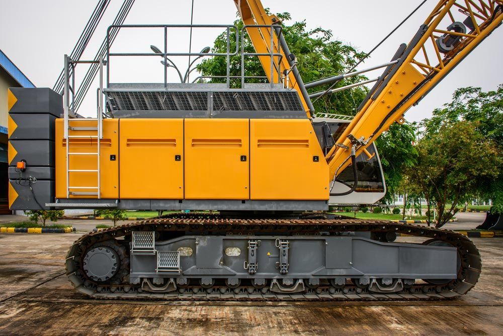 Large Yellow Crane is Parked in a Parking Lot — Barkly Hire in Ryan, QLD