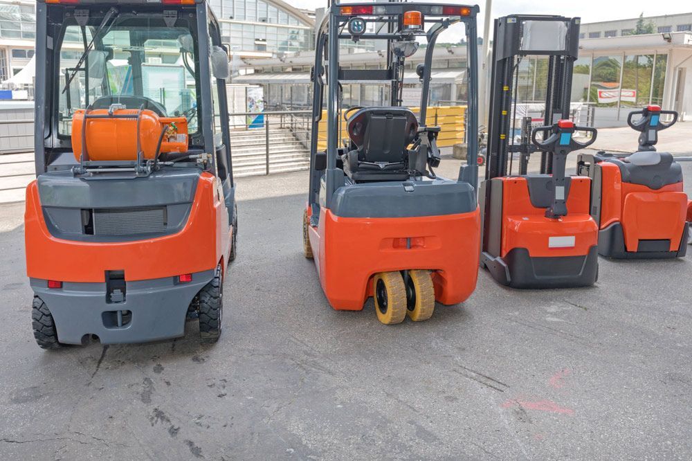 Three Forklifts Are Parked Next to Each Other on the Street — Barkly Hire in Ryan, QLD