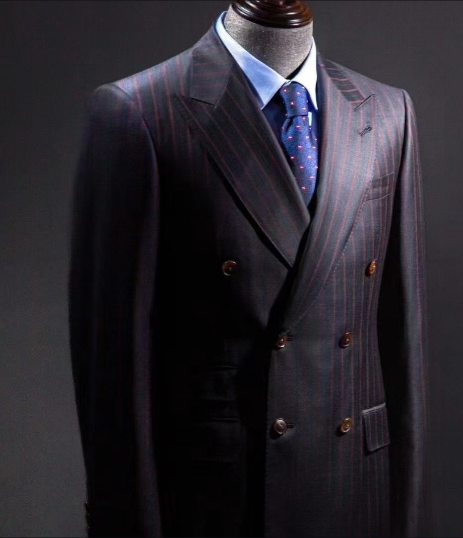 A man in a suit and tie is on a mannequin