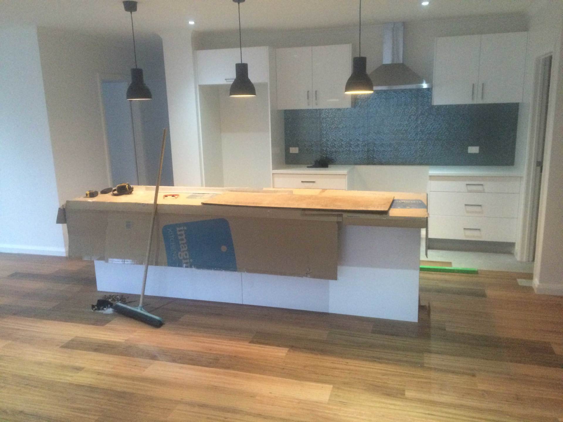 kitchen with three lights