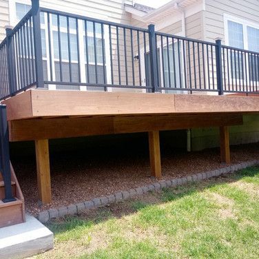 Wooden Deck with Black Railing — Bridgeton, MO — A+B Acquisitions
