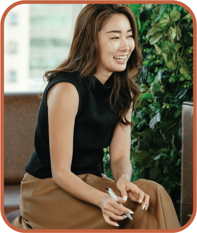 Professional woman with ADHD laughing openly, embracing authenticity