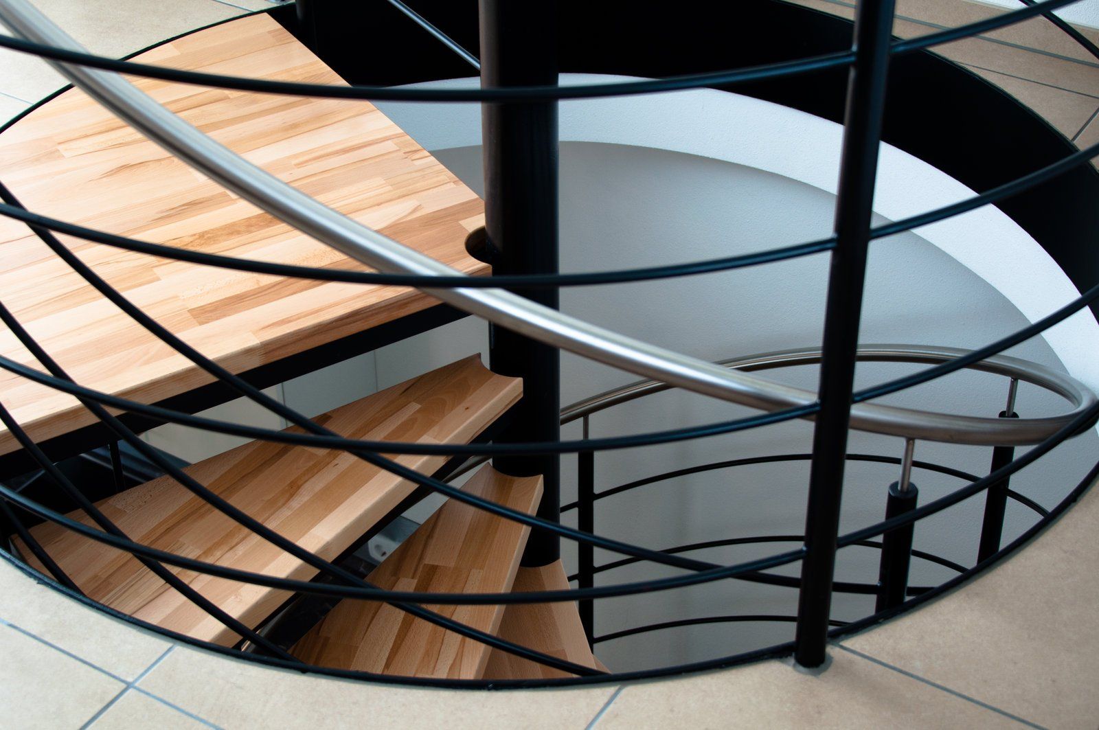 a modern type of spiral stair design by Custom Stairs Orlando