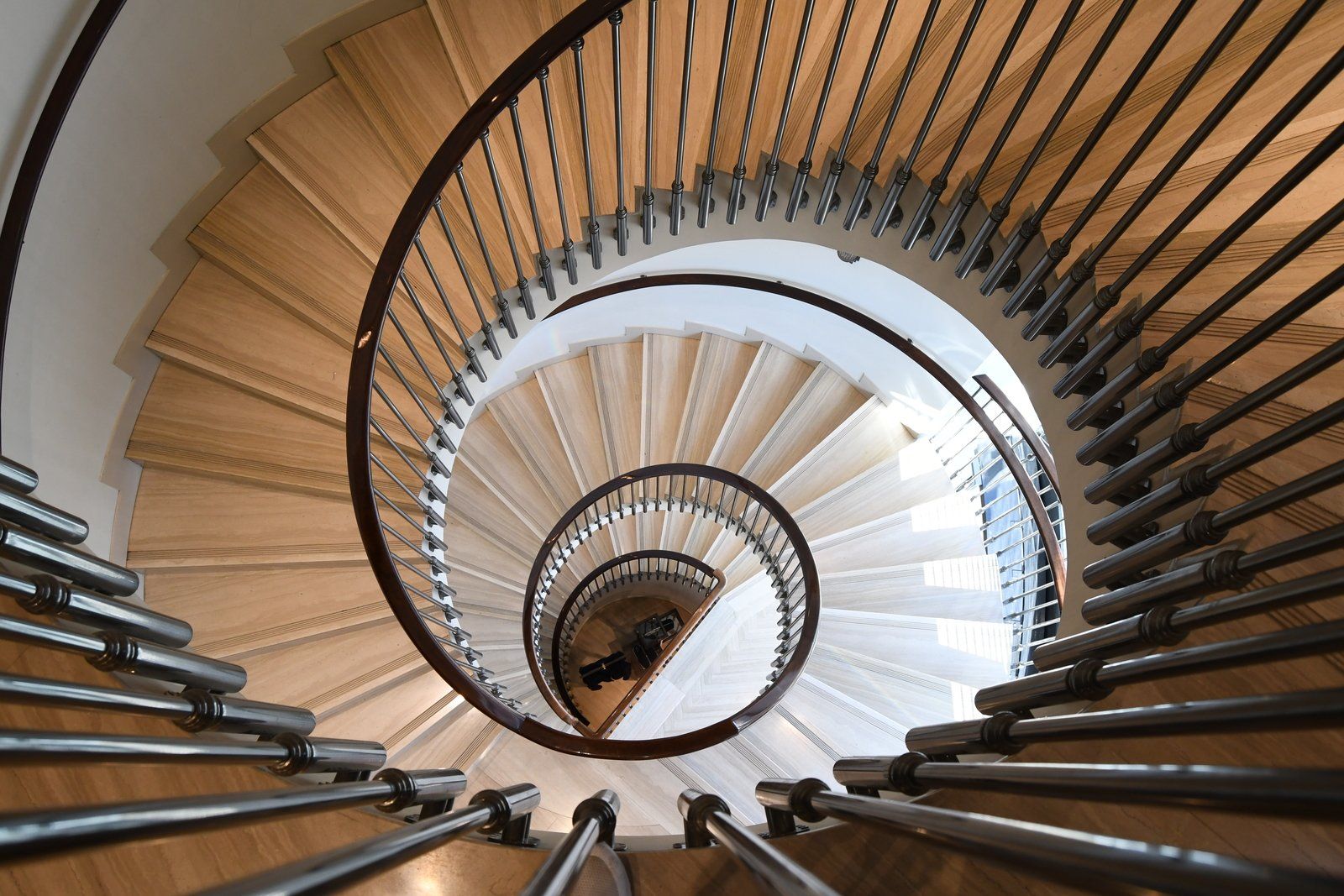 a combination of metal and wood spiral stair