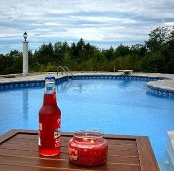 Bottle of Soda near the pool — In-ground pool in Lewiston, ME