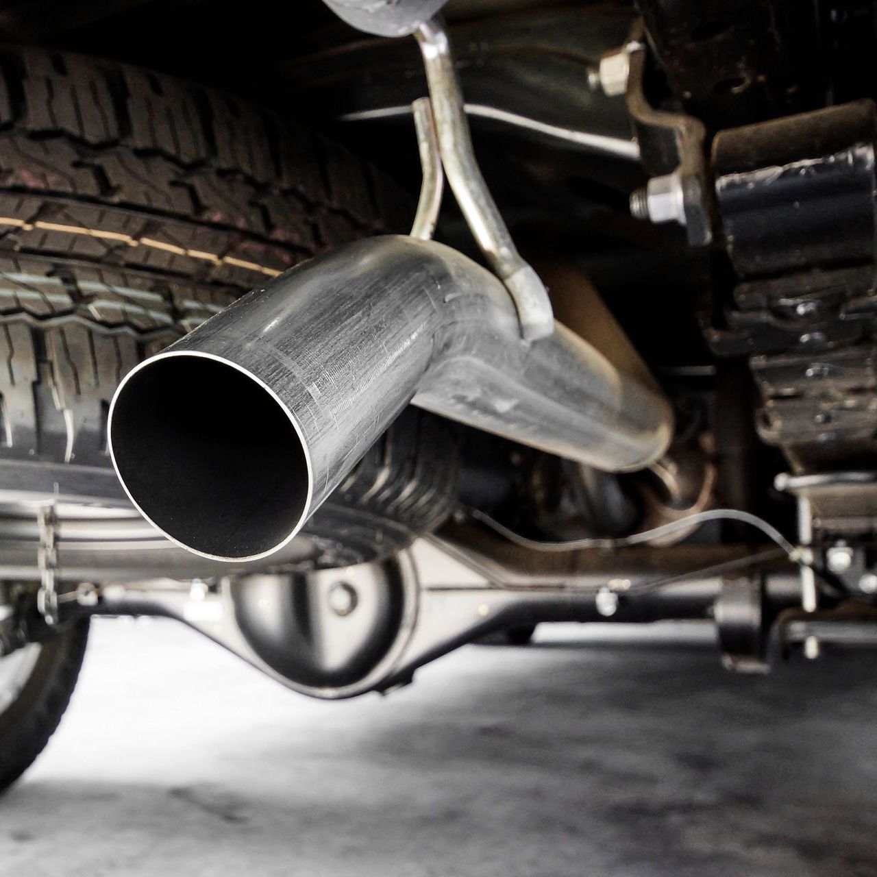 A close up of a exhaust pipe on a car