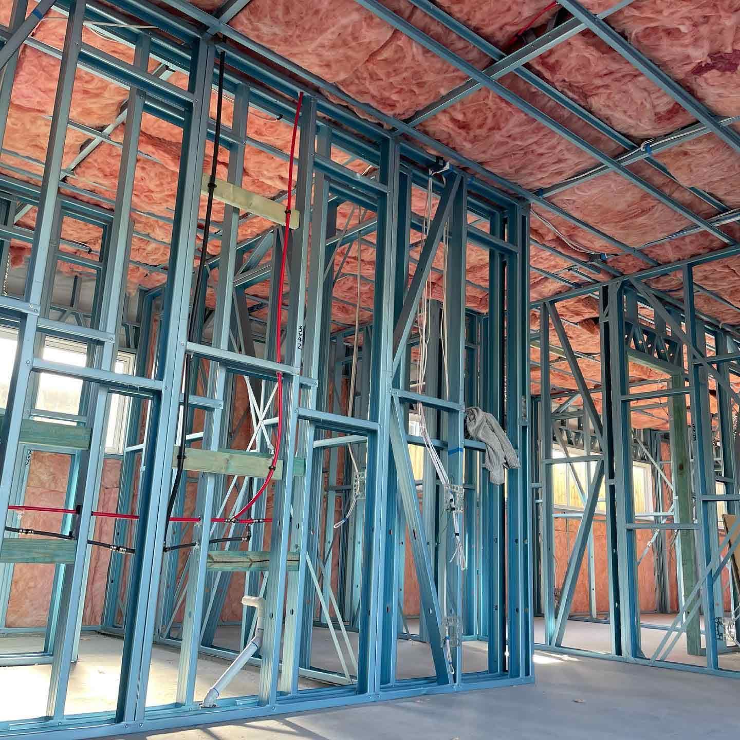 Inside of a building under construction with insulation on the ceiling — Home Insulation in Brisbane QLD