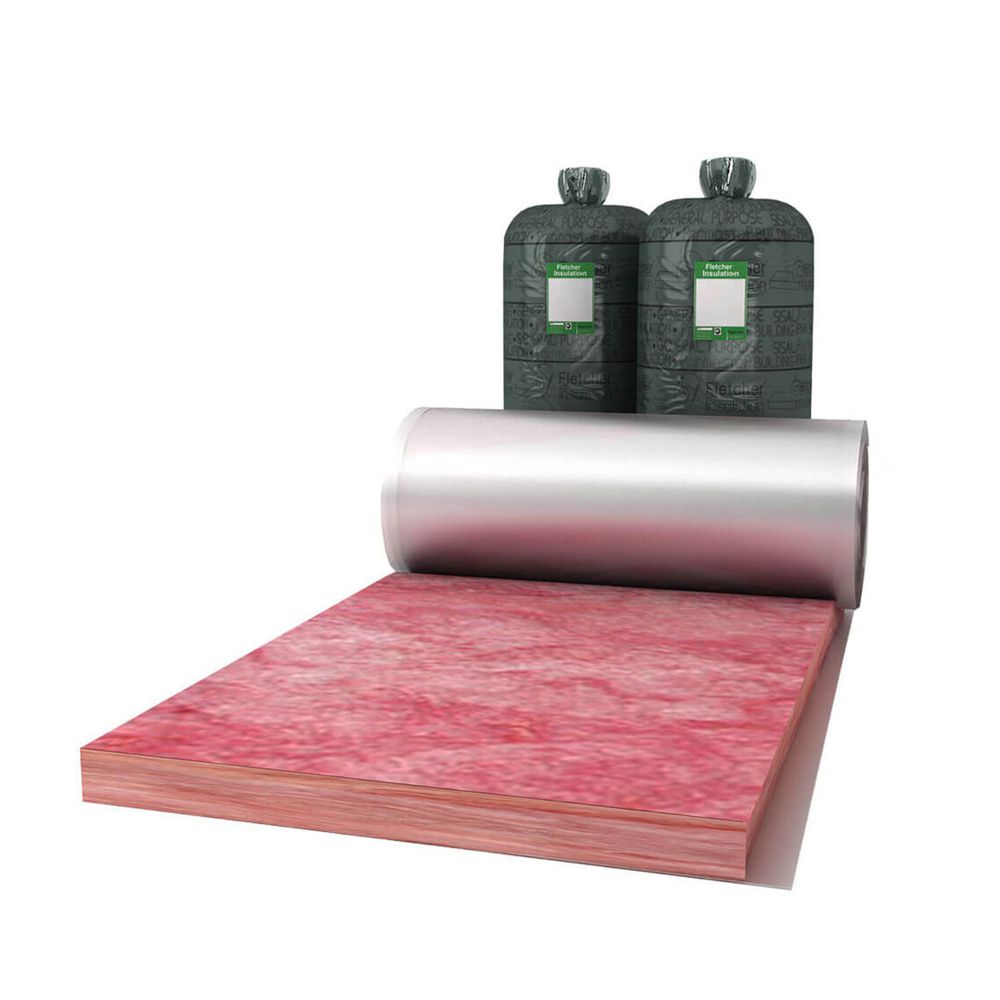 A roll of insulation is sitting on top of a bed next to two bottles.