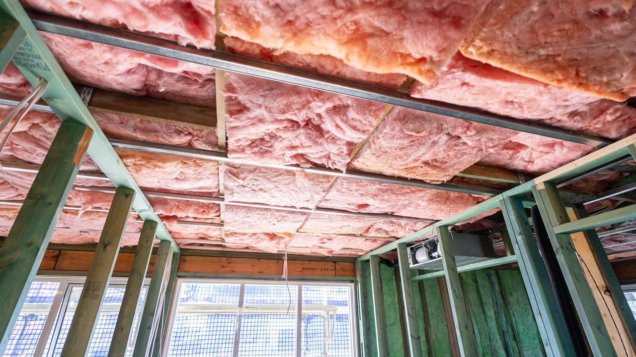 Duct is hanging from the ceiling of an attic — Home Insulation in Tweed Heads NSW