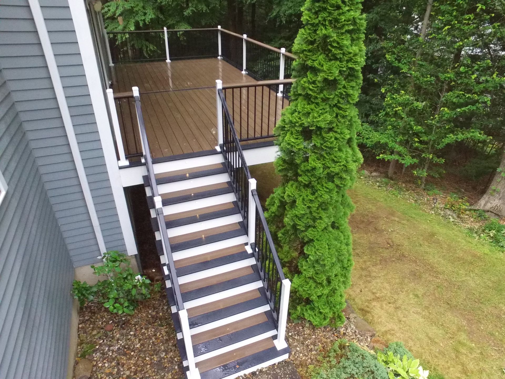 An aerial view of a deck with stairs leading up to it