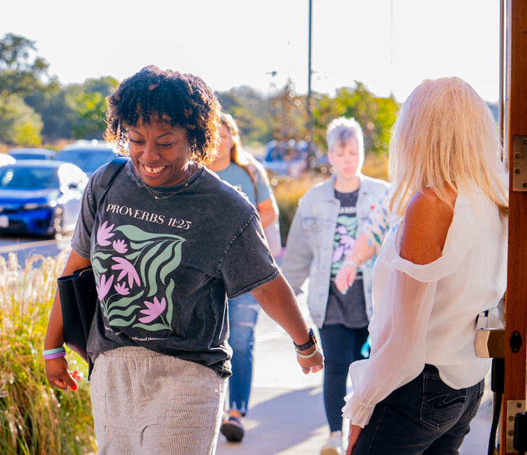 Women arriving at the Girlfriends event