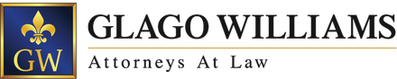 Logo of Glago Williams law firm: blue and gold emblem with 