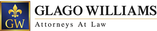 Logo of Glago Williams law firm: blue and gold emblem with 