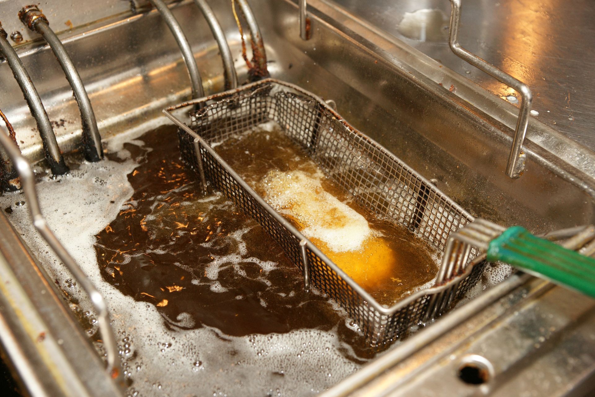 A Yellow Vacuum Truck Is Parked In Front Of A Building — Byram, MS — Dier’s Vacuum Service