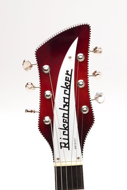 A red and white rickenbacker guitar headstock
