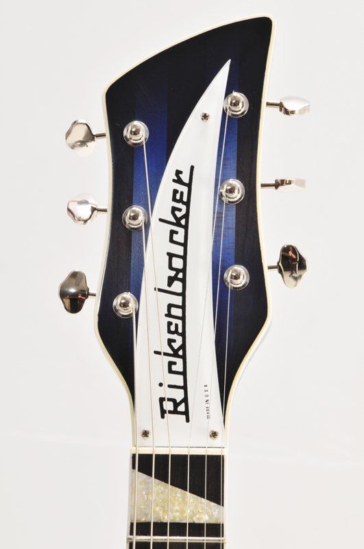 The headstock of a rickenbacker electric guitar