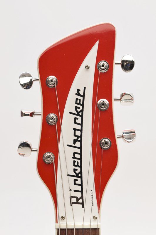 A red and white rickenbacker guitar headstock