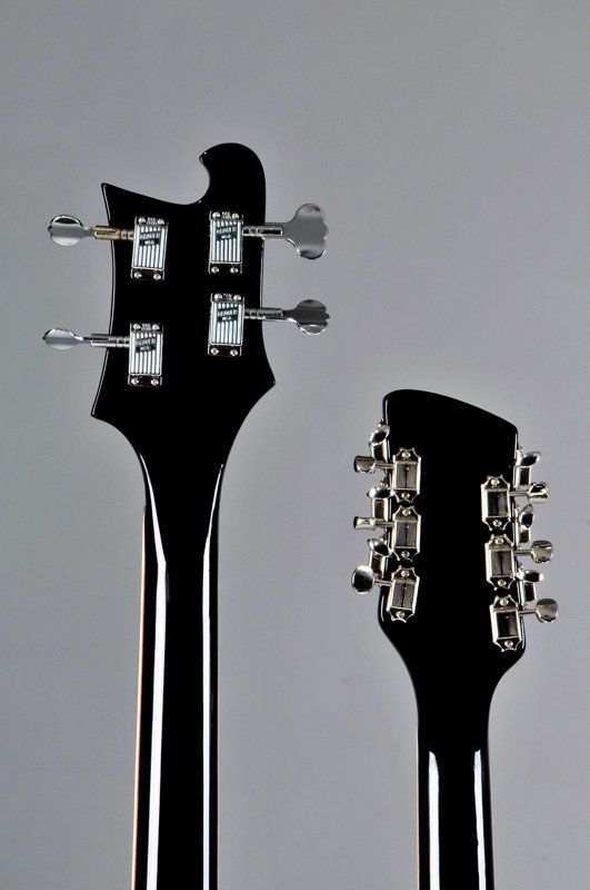 A close up of a guitar headstock and neck