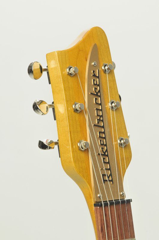 The headstock of a rickenbacker electric guitar