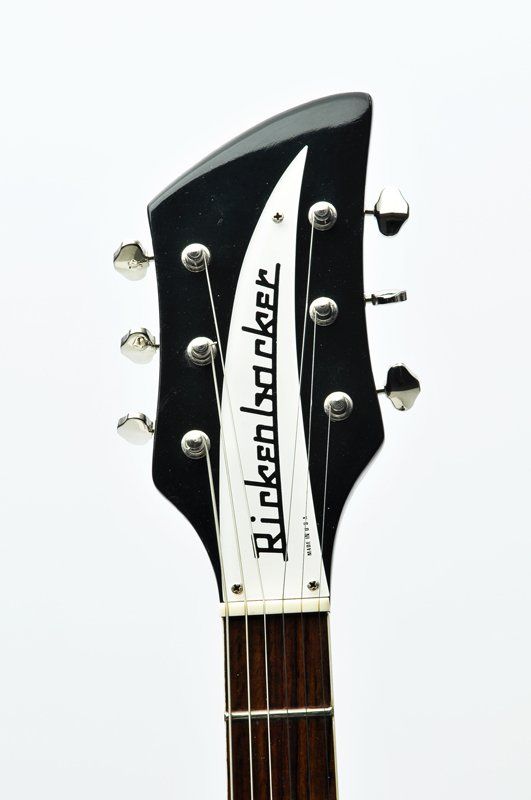 The headstock of a rickenbacker electric guitar