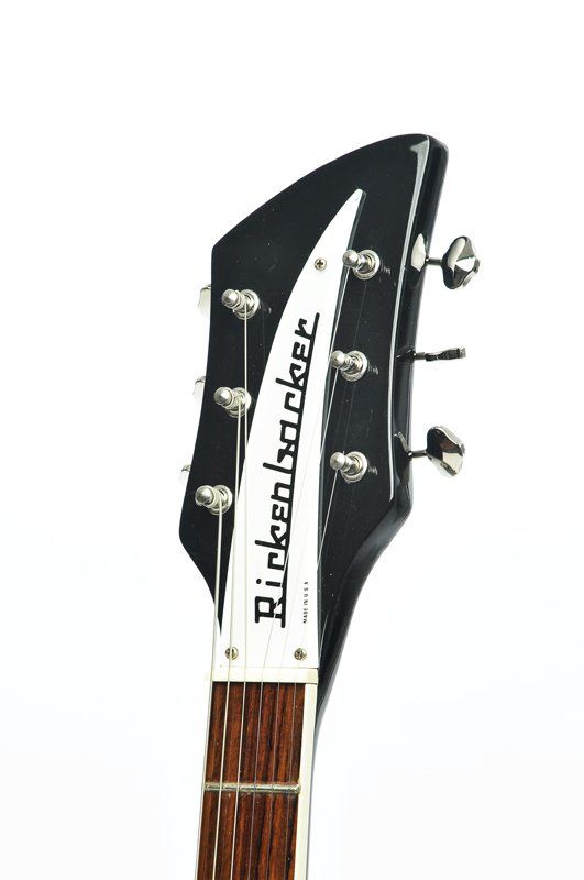 The headstock of a rickenbacker electric guitar