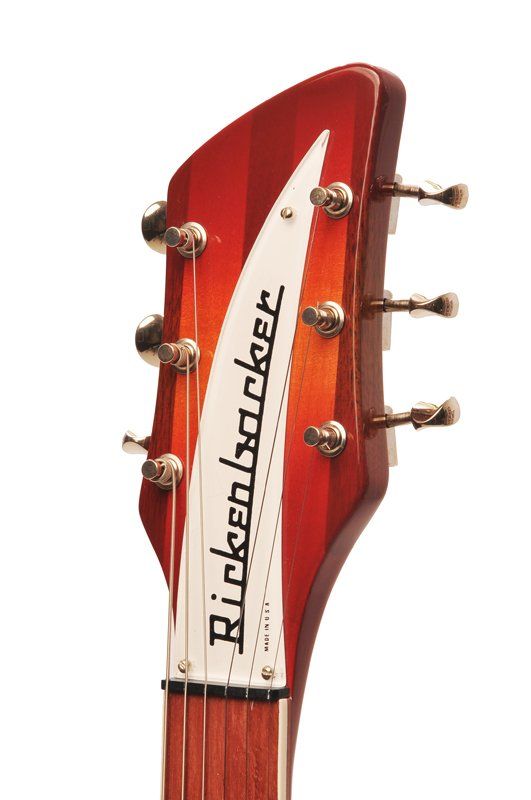 A close up of a rickenbacker guitar headstock