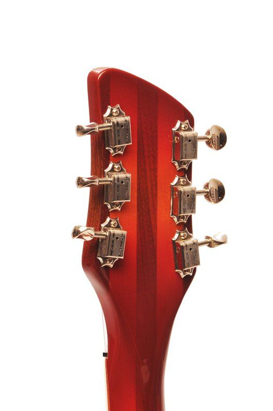 A close up of a guitar headstock on a white background