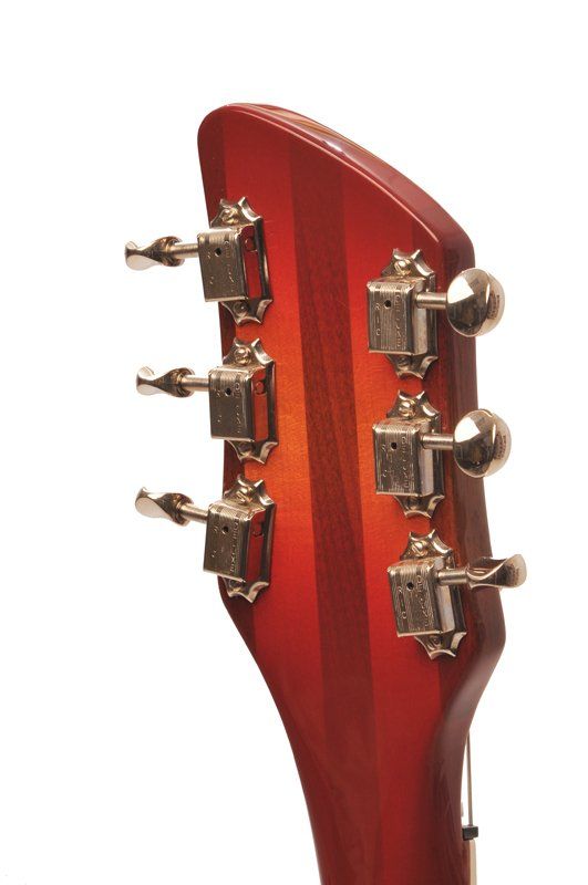 A close up of the headstock of an electric guitar