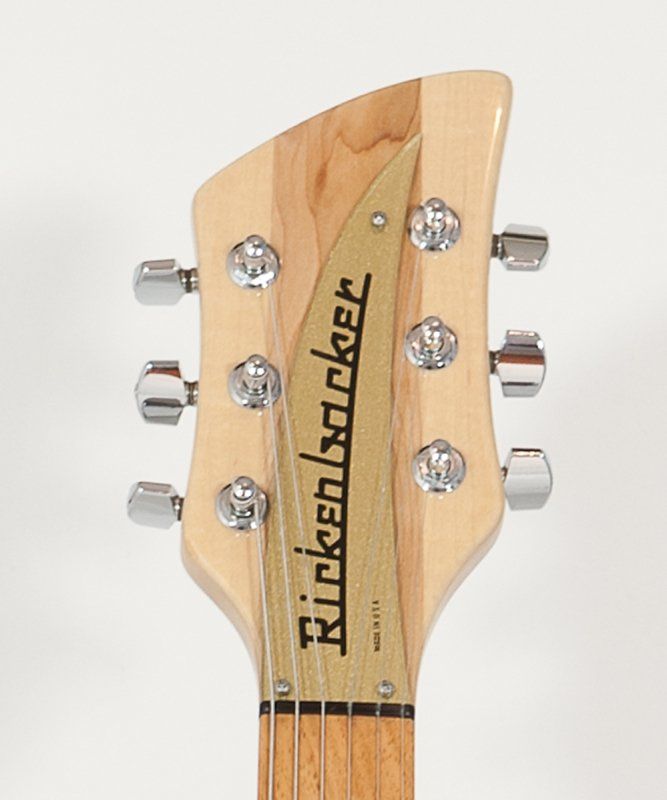 The headstock of a rickenbacker electric guitar
