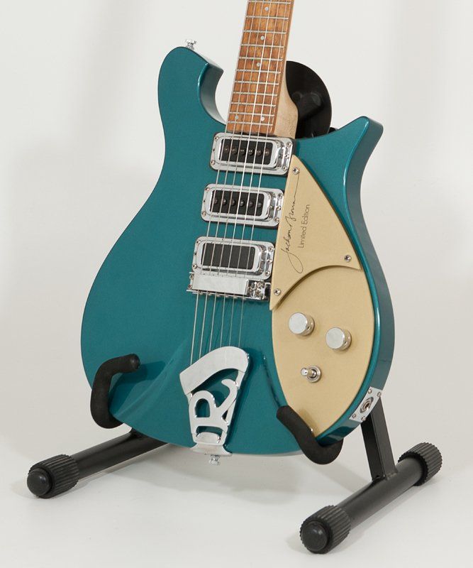 A blue guitar with the letter r on it