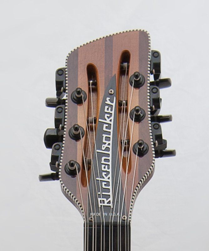 The headstock of a rickenbacker guitar is shown