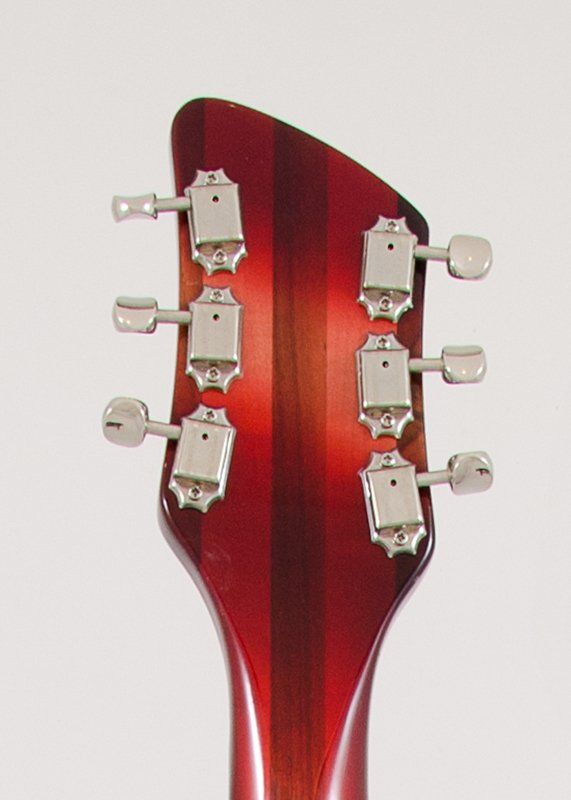 A close up of the headstock of a guitar