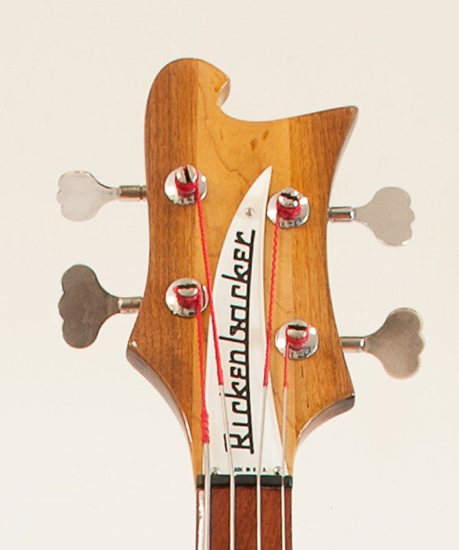 The headstock of a rickenbacker bass guitar