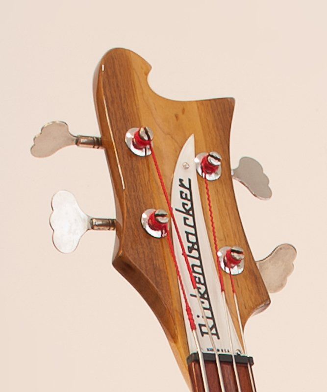 The headstock of a rickenbacker bass guitar